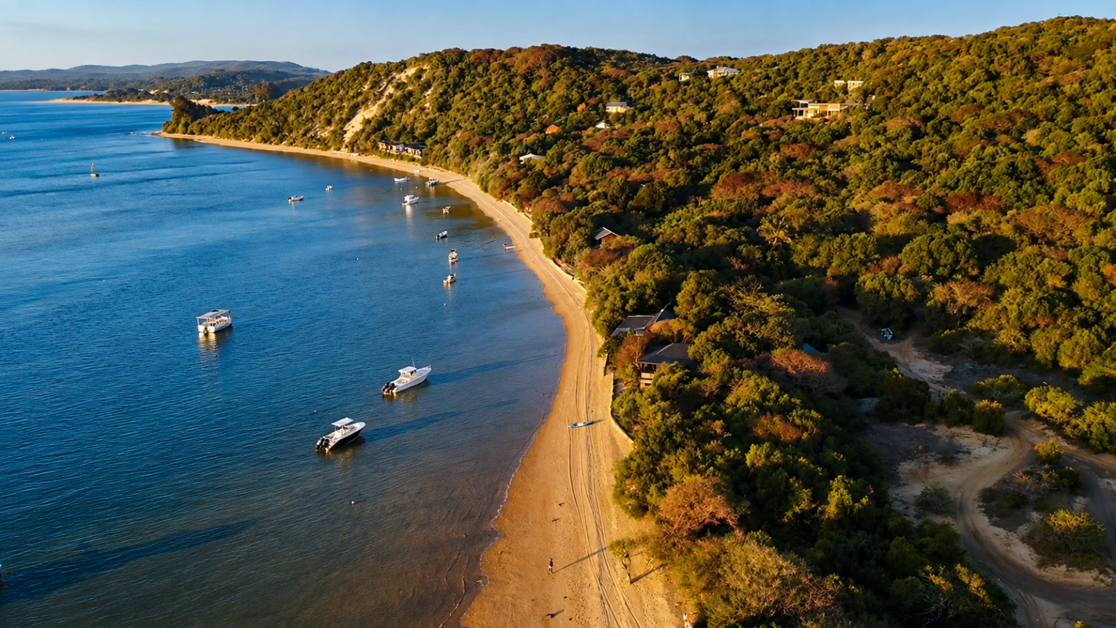 Aerial view over Santa Maria Bay with turquoise water along the Bemugi's shoreline