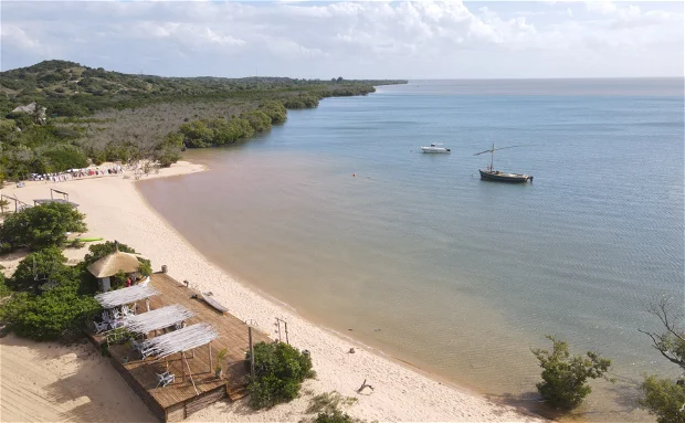 Aerial view over Santa Maria Bay with turquoise water along the Bemugi's shoreline